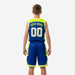 Opposite side view of royal blue youth sublimated basketball uniform highlighting the V-neck collar, bound armholes, and chevron shorts leg detail