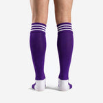 Close-up of three white stripe bands on Royal Purple custom soccer socks ribbed cuff detail