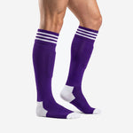 Royal Purple and White custom soccer socks showing full knee high length and white reinforced heel zone, side view