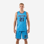Front view of sky blue and navy sublimated basketball jersey uniform with floral pattern, team name and number 21