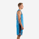 Side view of sky blue and navy basketball jersey uniform showing navy side panel inserts and pointed hem shorts