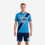 Custom soccer uniform design in sky blue and navy with diagonal colorblock panels, front view