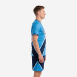 Sky blue and navy custom soccer kit side view showing diagonal stripe panels on jersey and shorts
