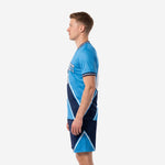 Custom soccer uniform design side profile showing navy chevron shorts and sky blue jersey