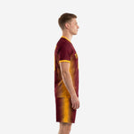 Custom soccer team uniforms with spike-stripe sublimated print, Maroon and Athletic Gold, left side view on adult male model