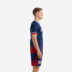 Custom men's soccer team uniforms side view showing Crimson splash graphic on Navy Blue jersey and matching shorts