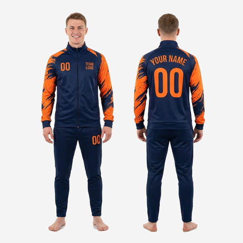 Full 2-piece splash print soccer training tracksuit in navy blue and athletic orange, custom sublimated for team orders YS to 3XL