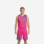 Pink dominant reverse side of the custom reversible basketball uniform set with gray brush-splash graphic on jersey and shorts front panel