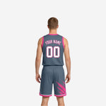 Side view of the gray and pink brush-splash reversible basketball uniform showing armhole binding and shorts side-split hem detail