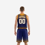 Back view of custom navy and gold basketball uniform with player name on upper back and number centered below