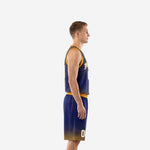 Right side view of custom navy and gold basketball uniform showing gold armhole binding and halftone shorts hem