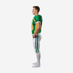 Side view of green and gold sublimated American football uniform showing gold shoulder panel V-neck jersey and white pants with green side stripe