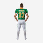 Opposite side view of custom sublimated American football uniform in green and gold showing jersey side panel and white pant stripe detail