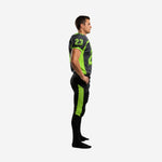 Side view of charcoal and lime green sublimated football jersey with set-in short sleeves and sleeve number on shoulder cap