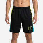 Sublimated basketball shorts in black with neon lime to cyan gradient side panels, front and back view showing player number on front right thigh