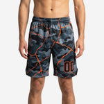 Custom sublimated basketball shorts in grey and black camo with orange crack lines and player number on the left leg panel, front view