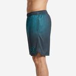 Right side view of teal and grey sublimated basketball shorts showing full hex pattern panel wrap and athletic cut leg opening