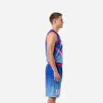 Custom sublimated basketball uniform blue and pink gradient V-neck jersey with arced team name and front number plus matching shorts front view