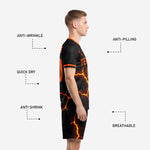 Detail view of sublimated all black soccer uniform with orange and gold lava crack design