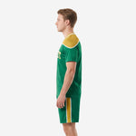 Custom soccer uniform designer kit in kelly green and athletic gold, side profile showing yoke detail
