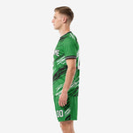 Sublimated green and black soccer uniform back-side view with player name and number