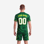 Green soccer uniforms jersey detail showing V-neck collar with dark forest trim and neon yellow cuff accent stripes