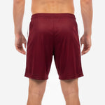 Sublimated maroon soccer shorts close-up of player number printed on lower left leg with reinforced seam at white panel edge