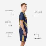 Sublimated navy and gold soccer kit back view showing player name and number on top soccer uniform