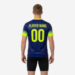 Custom navy soccer training jersey front detail showing team name and number in neon yellow sublimation print