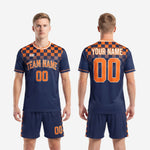 Full-dye sublimated orange soccer uniform in navy blue with checkerboard gradient design, K2 Sportswear men's kit