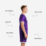 Side profile of purple and hot pink sublimated soccer kit showing gradient colorway from upper chest to shorts hem