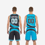 Close detail of teal and white stripe hem binding on charcoal reversible basketball shorts with player number on left leg