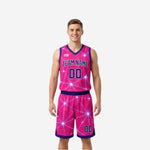 Sublimated reversible basketball uniforms flipped to the pink side with purple geometric star pattern, team name and number 00 on chest, matching shorts, front view