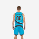 Side view of teal and charcoal reversible basketball uniform showing the reverse side panel and shorts hem stripe detail