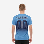 Sublimated sky blue and navy blue soccer jersey front detail showing team name and squad number print zones