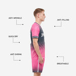 Sublimated soccer uniform hot pink charcoal halftone pattern close up