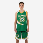 Green youth basketball uniforms with gold swoosh arc design, arched team name and number 23 on jersey, matching green shorts with gold chevron hem, full set front view