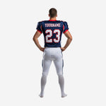 Back view of custom tackle football uniform in navy blue and white showing back number placement and nameplate area on jersey with navy pant stripe detail
