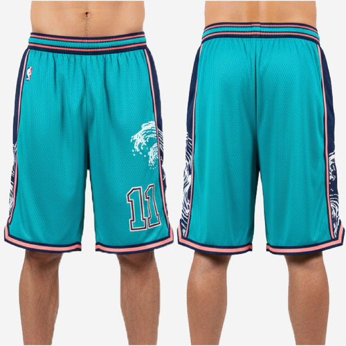 Size and specification sheet for custom teal basketball shorts showing youth through adult size run and print zone layout