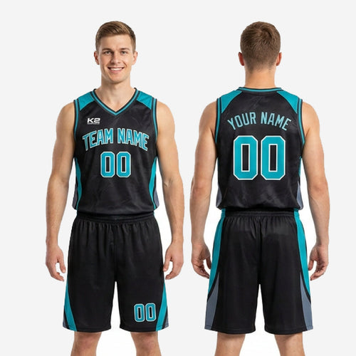 Detail view of teal basketball uniform shorts showing curved teal side panel, grey accent, and sublimated number on lower left leg