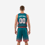 Teal and coral basketball uniform side detail view showing diagonal speed lines on jersey chest and lightning bolt shorts panel