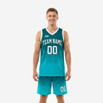 Teal basketball uniforms gradient fade full set front and back showing arched team name white V-neck binding and matching aqua shorts with player number