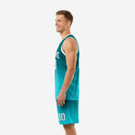 Custom teal and aqua basketball uniform set side view showing gradient fade jersey and matching shorts with hem side splits and drawcord waistband