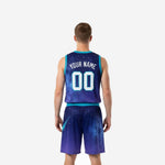 Second side view of navy and teal basketball uniform showing star-field galaxy pattern on jersey and shorts with teal waistband