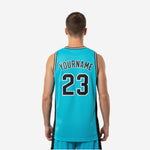 Opposite side view of the teal and black custom sleeveless basketball jersey showing armhole binding and breathable performance knit fabric