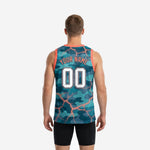 Left side view of custom teal basketball jerseys showing athletic cut torso, coral orange armhole trim and camo sublimation detail