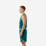 Side view of teal and gold matching basketball jersey and shorts showing gold armhole binding and shorts hem band