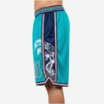 Left side view of teal and navy custom basketball shorts with sublimated crest graphic spanning the full thigh panel