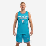 Front view of teal and navy custom basketball uniform with wave chest graphic and player number 11