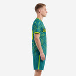Left side view of teal neon yellow sublimated soccer kit with circuit board graphic